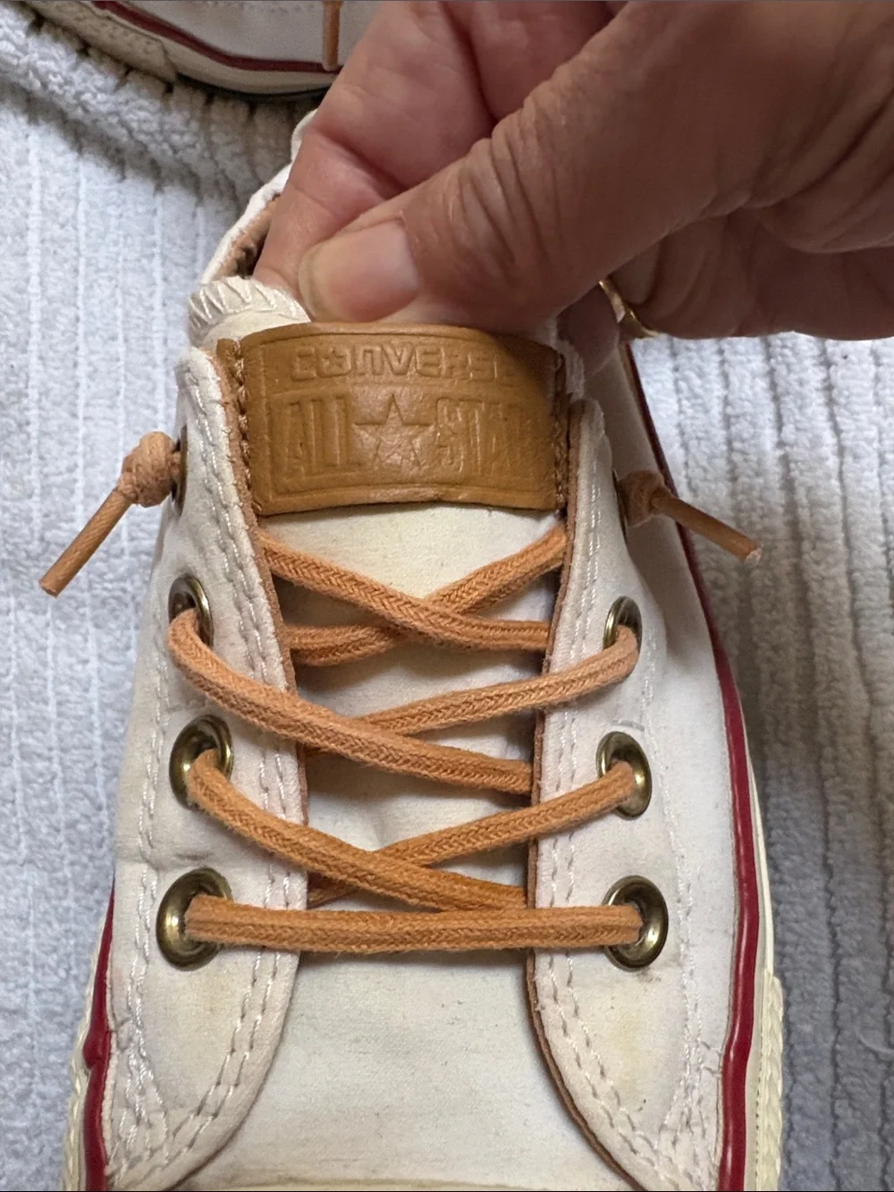 Converse Low-Top Canvas Sneakers in Cream with Tan Laces and Red Trim